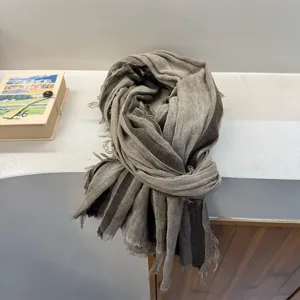 Retro striped cotton linen scarf for women, lightweight fringed neck warmer for travel and casual wear.