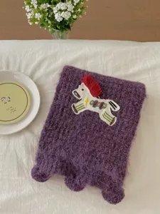 Cozy purple knit scarf featuring cute embroidered horse and red fringe for winter warmth.