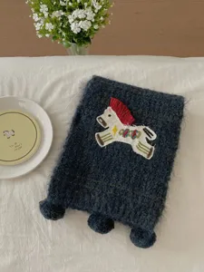 Knitted winter scarf with cute embroidered horse patch and cozy fringe for women style.