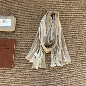 Gradient crinkle scarf detail shot, lightweight breathable fabric, stylish daily wear accessory.