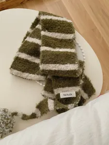 Green and beige striped knitted scarf with cute pom pom, cozy winter warm fashion neck warmer.