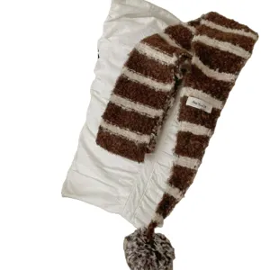 Cozy brown and white striped winter knitted scarf with cute pom-pom for women and girls.