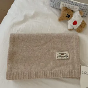 Classic beige knit scarf for women, warm winter solid color soft wool scarf main view.