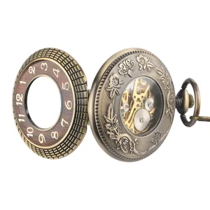 Vintage bronze mechanical pocket watch with hollow carved case and wooden dial scale.
