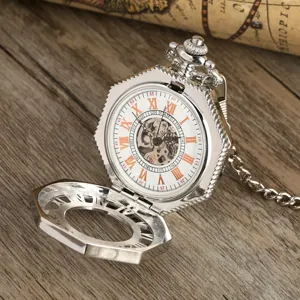 Silver mechanical pocket watch with octagonal openwork case, Roman numerals and vintage chain detail.