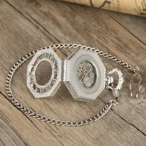 Silver tone octagonal mechanical pocket watch with chain, vintage skeleton dial detail view.