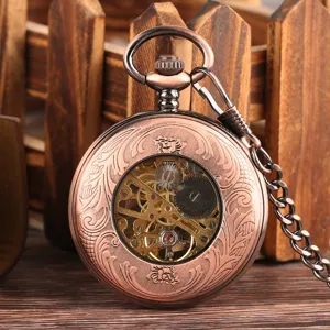 Detailed view of vintage bronze mechanical skeleton pocket watch with intricate engraved case.
