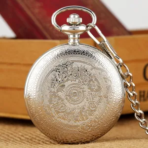 Vintage zilveren zakhorloge met prachtig gegraveerd bloemmotief en bijpassende ketting kwarts.