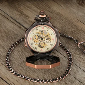 Vintage bronze mechanical pocket watch with hollow carved hexagonal case and roman numerals.