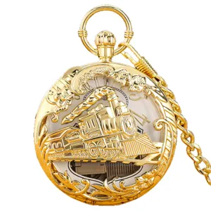 Vintage gold mechanical pocket watch with hollow steam train design and music box movement.