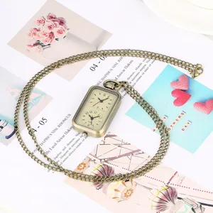 Bronzen rechthoekige kwarts zakhorloge met dubbele tijdzone en trui ketting hanger.