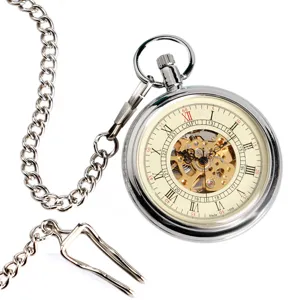 Detailed close-up of vintage silver mechanical pocket watch skeleton dial with metal chain.