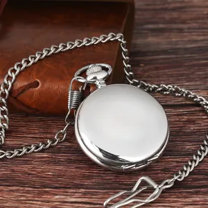 Detailed view of vintage silver mechanical pocket watch with long chain and retro leather box.