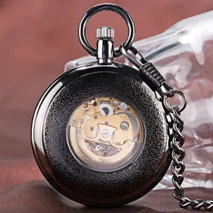 Classic black mechanical pocket watch close-up detail skeleton movement with chain