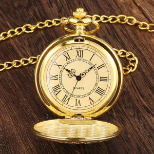 Vintage gold quartz pocket watch with roman numerals chain and carved flip cover design.