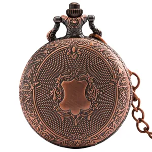 Vintage bronze quartz pocket watch featuring engraved shield pattern and metal chain detail.