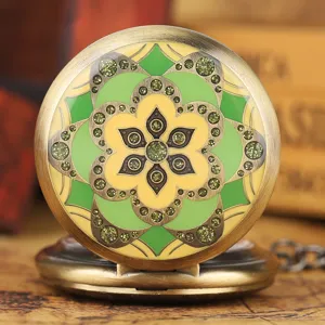 Vintage bronze mechanical pocket watch featuring detailed green enamel floral pattern.