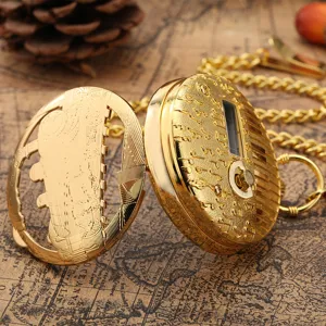 Vintage gold quartz pocket watch with music box design, intricate carved hollow case and chain.