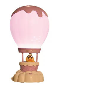 Simpatica lampada da notte a mongolfiera con papera, perfetta decorazione da scrivania.