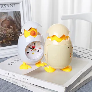 Simpatico sveglia pulcino guscio d'uovo di cartone animato, decorazione scrivania bambini.