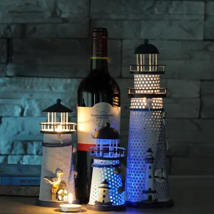 Set portacandela faro in ferro mediterraneo, ornamenti decorativi marini lampeggianti.