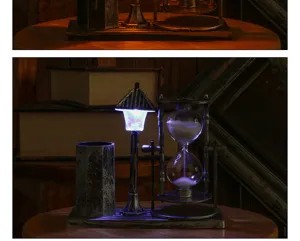 Vintage resin hourglass pen holder with night light, creative European style desk decor ornament.