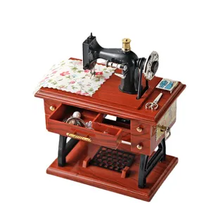 Klassische Miniatur Nähmaschine Spieluhr, Retro Kunststoff Dekorationsartikel und kreatives Geschenk.