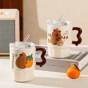Cute ceramic capybara mug with straw and unique brown handle, cozy desktop detail view.