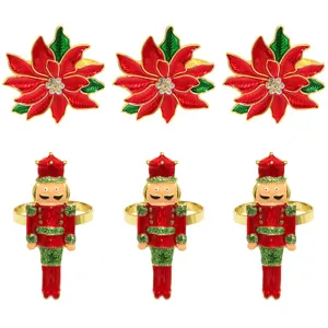 Christmas napkin rings set featuring red poinsettia and nutcracker soldier designs for table decor.