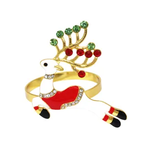Detailed close-up of the crystal rhinestone Christmas elk napkin ring, shiny gold metal finish.