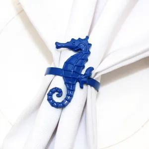 Blue seahorse napkin ring detail shot, elegant table decor for weddings, parties, and daily use.