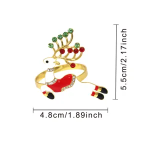 Christmas reindeer napkin ring close-up, gold metal, red green rhinestones, festive table.