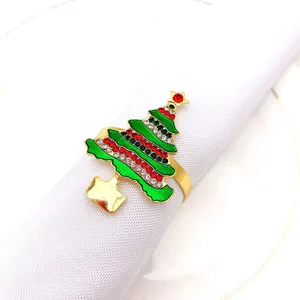 Exquisite Christmas tree napkin ring detail, gold metal with colorful rhinestones for tables.
