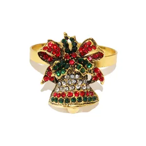 Close-up detail view of the sparkling Christmas rhinestone bell napkin ring for table decor.