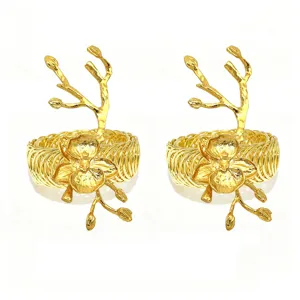 Exquisite golden orchid flower curtain buckle, elegant metal spring tieback detail.