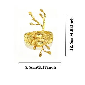 Gold orchid curtain ring detail view, showcasing intricate floral design and dimensions.