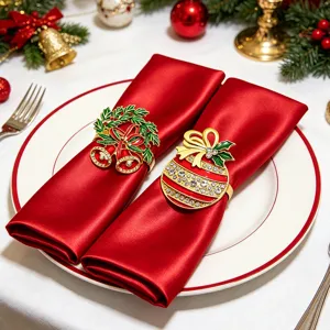 Festive Christmas rhinestone napkin rings metal bell bauble bow set for table decor.