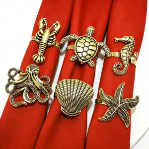 Lot de ronds de serviette marins en métal, homard, tortue, seahorse, coquillage, étoile de mer.