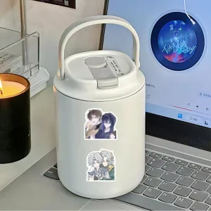 Detail view of cute anime character graffiti stickers displayed on a white portable water cup.