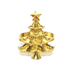 Gold metal Christmas tree napkin ring detail view, elegant table decor for holiday parties.