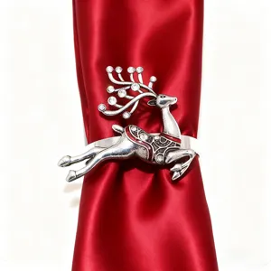 Exquisite Christmas elk napkin ring with silver metal and sparkling rhinestones for table decor.