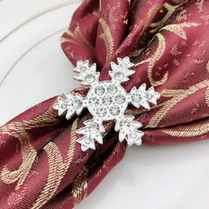 Silver rhinestone snowflake napkin ring detail shot, perfect for elegant holiday table decor.