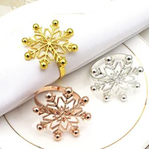 Snowflake napkin ring detail, metal material, elegant holiday table decor, multi-color set.