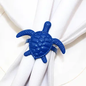 Blue turtle napkin ring detail shot, perfect for summer ocean themed dining table decor.
