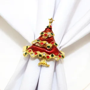 Elegante portatovaglioli a forma di albero di Natale con smalto rosso e strass luminosi.