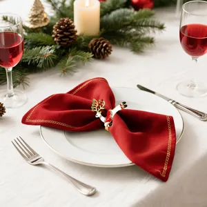 Christmas rhinestone reindeer napkin ring detail shot, elegant holiday table decor accessory.