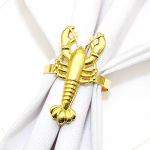 Gold lobster napkin ring detail shot, elegant table decor accessory for dining and parties.