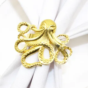Golden octopus napkin ring detail close up shot for exquisite table decoration accessories