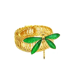 Modern luxury gold metal spring curtain tieback with elegant green enamel dragonfly decor.