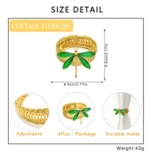 Close-up detail and size dimensions of the golden dragonfly curtain tieback, adjustable metal design.